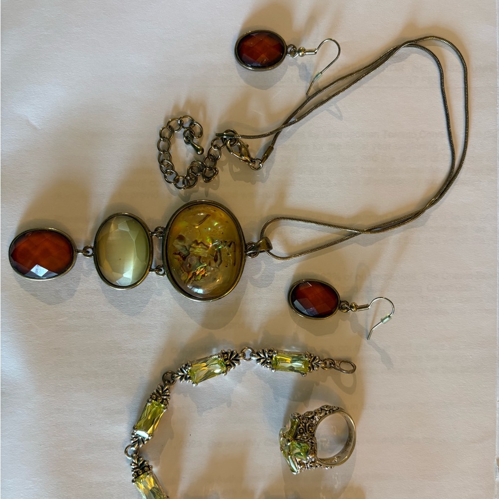 Cosmetic jewelry bundle.  Necklace and matching earrings, bracelet and ring